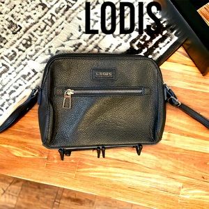 Lodi’s black small crossbody pebble leather floral interior adjustable strap